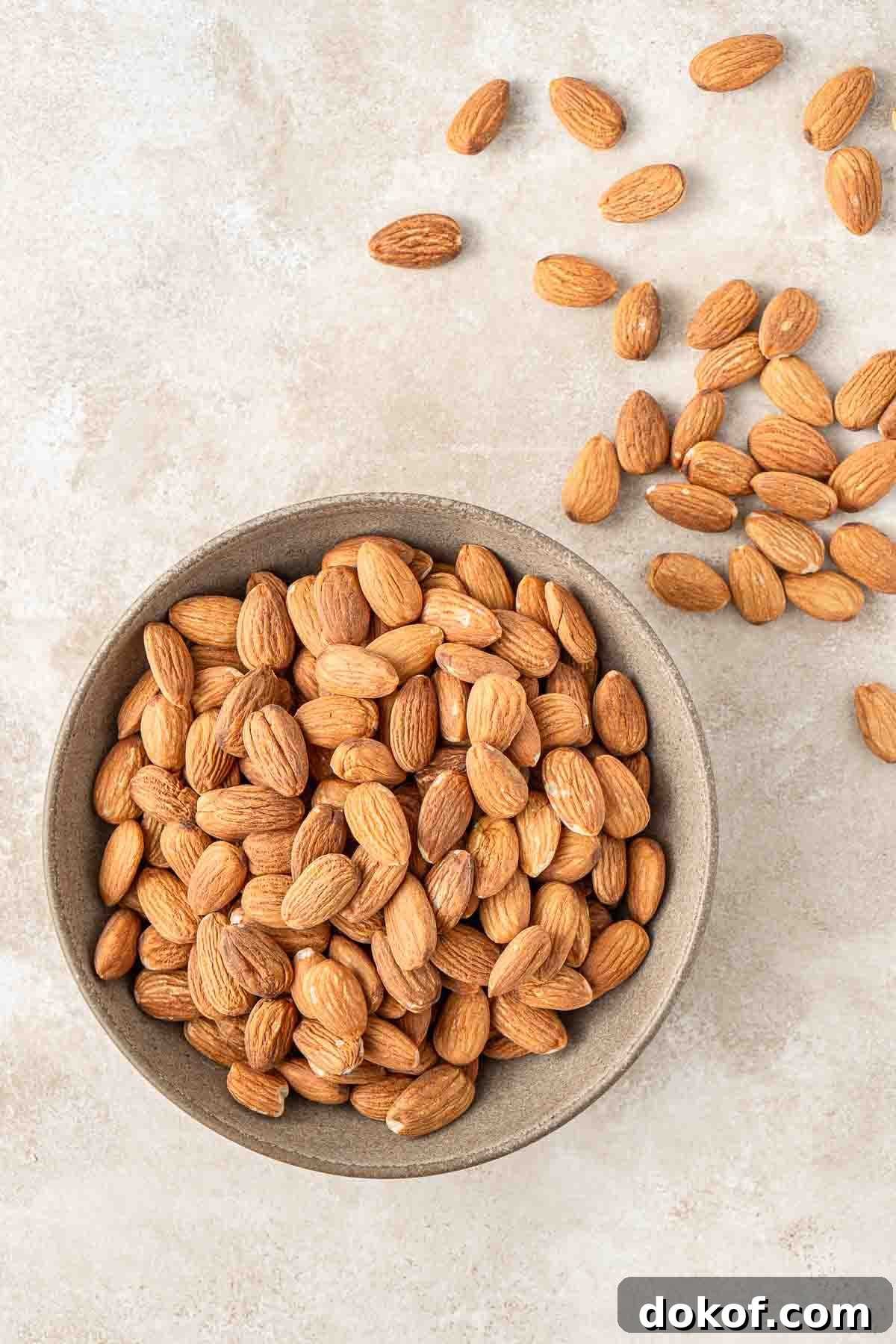 Homemade Almond Butter: Simple Recipe for Smooth, Creamy Spread 3 Whole almonds in a bowl.