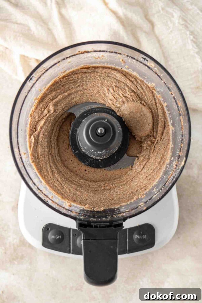 Homemade Almond Butter: Simple Recipe for Smooth, Creamy Spread 8 Almond butter smooth in the food processor.