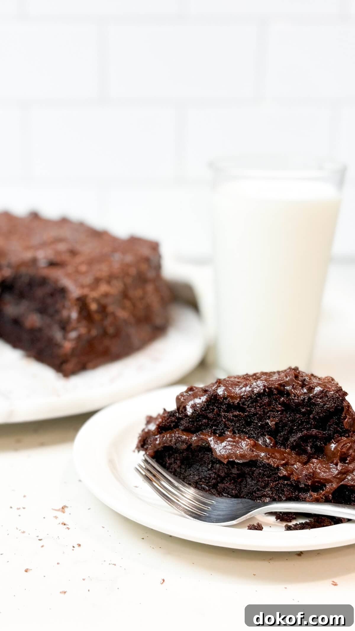 One slice of cake on a plate.