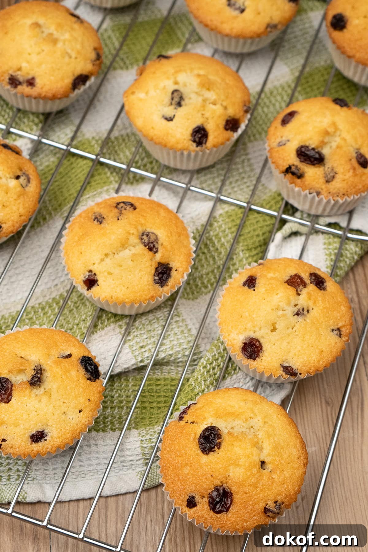 Queen cakes on a wire rack cooling off