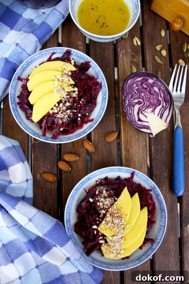 Sauerkraut Salad with Mango and Almonds — Refreshing Tangy Twist 3 Delicious and healthy 5-minute recipe of a sauerkraut salad with mango, almonds and lemon-cardamom vinaigrette. Vegan, vegetarian, raw, gluten-free.