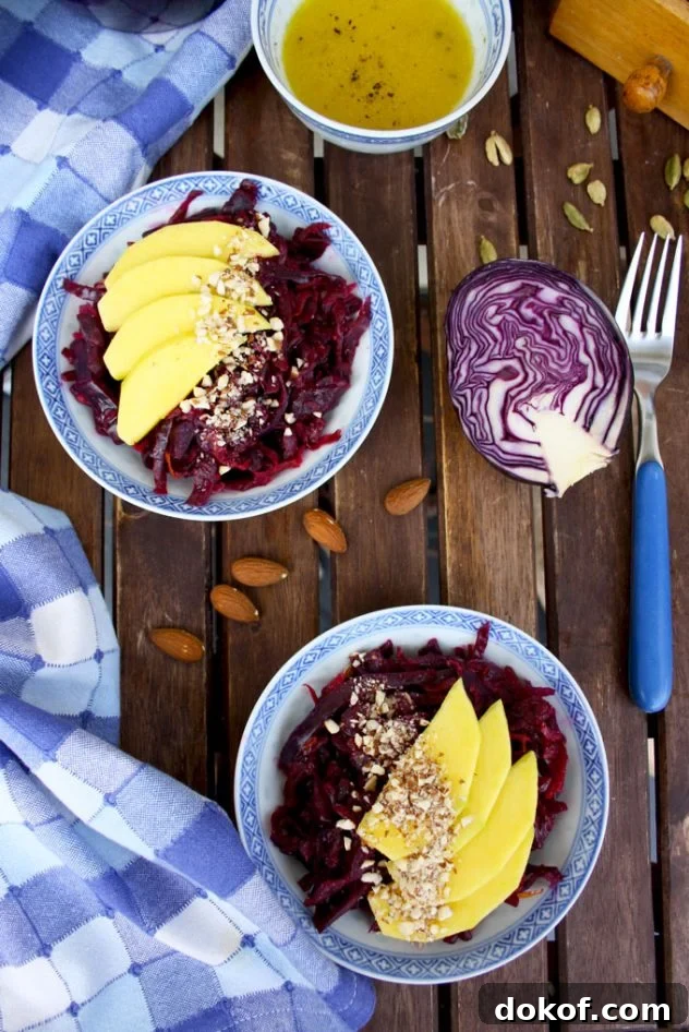 Sauerkraut Salad with Mango and Almonds — Refreshing Tangy Twist 6 Delicious and healthy 5-minute recipe of a sauerkraut salad with mango, almonds and lemon-cardamom vinaigrette. Vegan, vegetarian, raw, gluten-free.