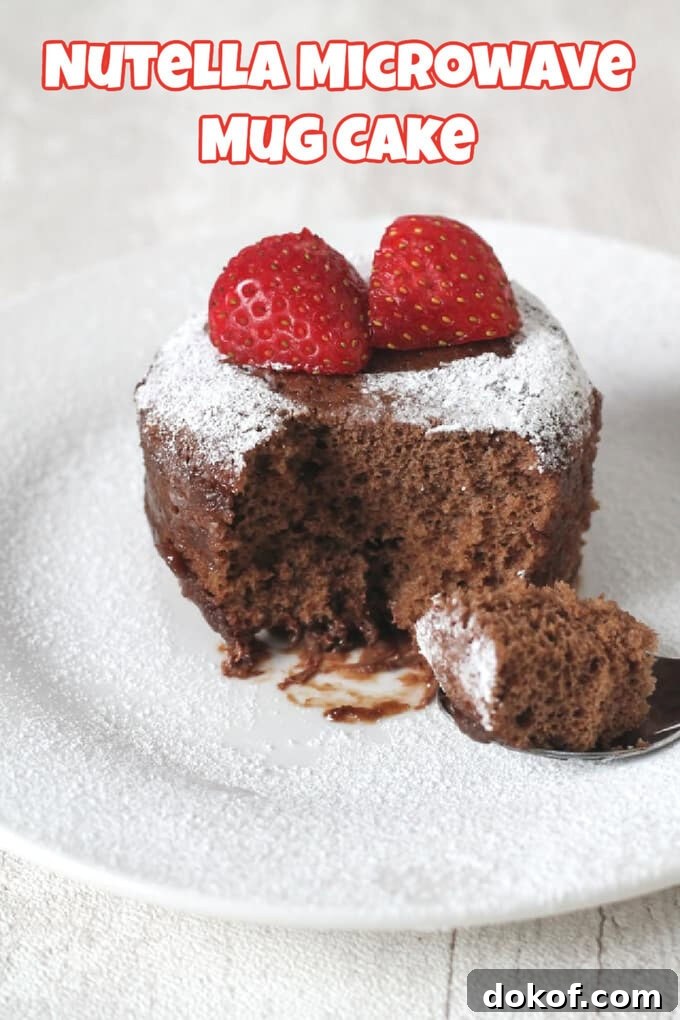 Nutella microwave mug cake served with strawberries