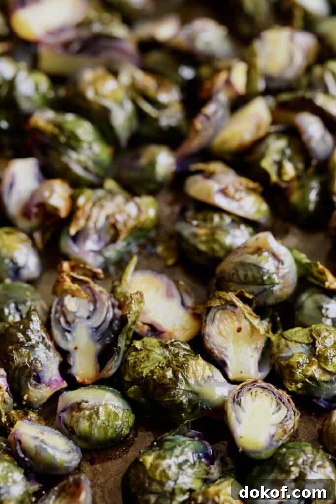 Crispy Roasted Purple Brussels Sprouts with Bacon & Parmesan 6 Close-up photo of roasted purple Brussels Sprouts.