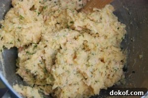 Polenta mixed with salmon and kale.