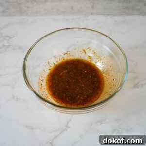 Lemon garlic chicken marinade in a bowl.