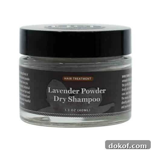A jar of QET Botanicals lavender powder dry shampoo.