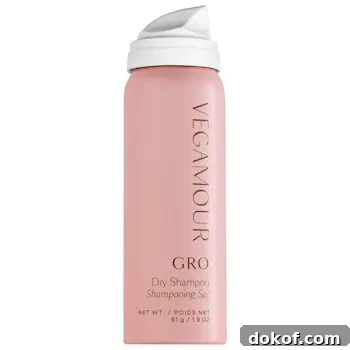 A bottle of Vegamour dry shampoo spray.