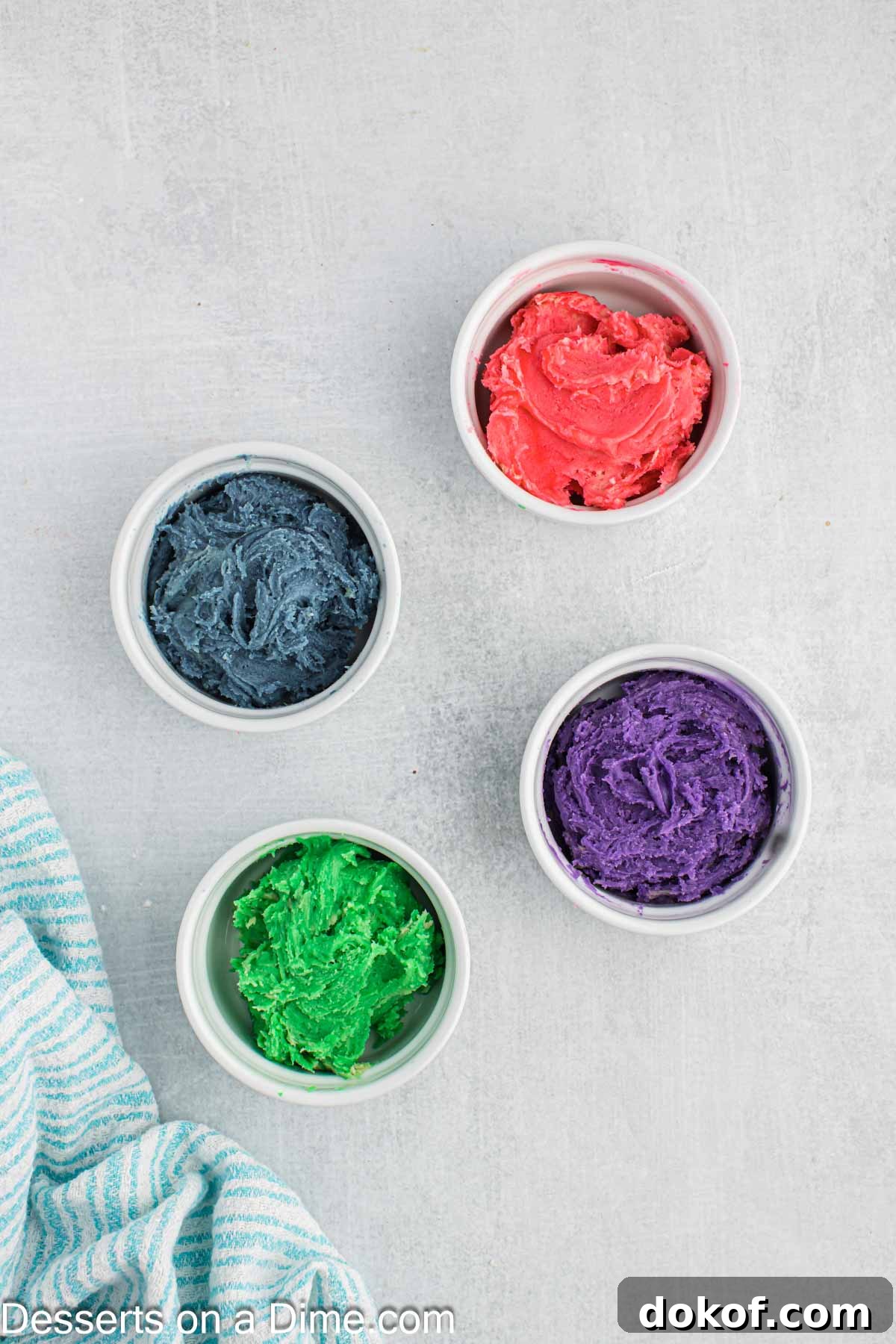 Dough separated into bowls with dye.