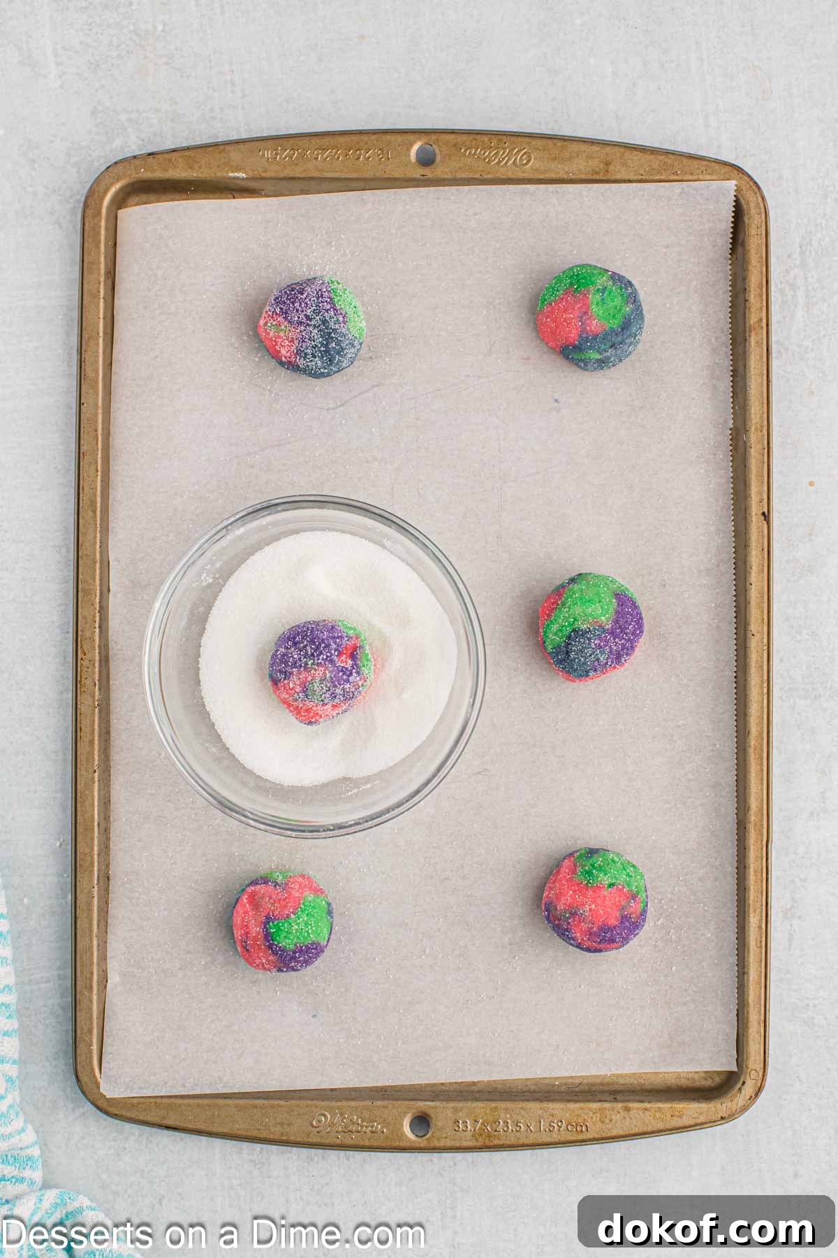 Cookie dough formed into balls and dipped in sugar.