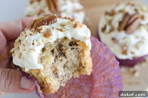 bite out of cupcake with pecan topping