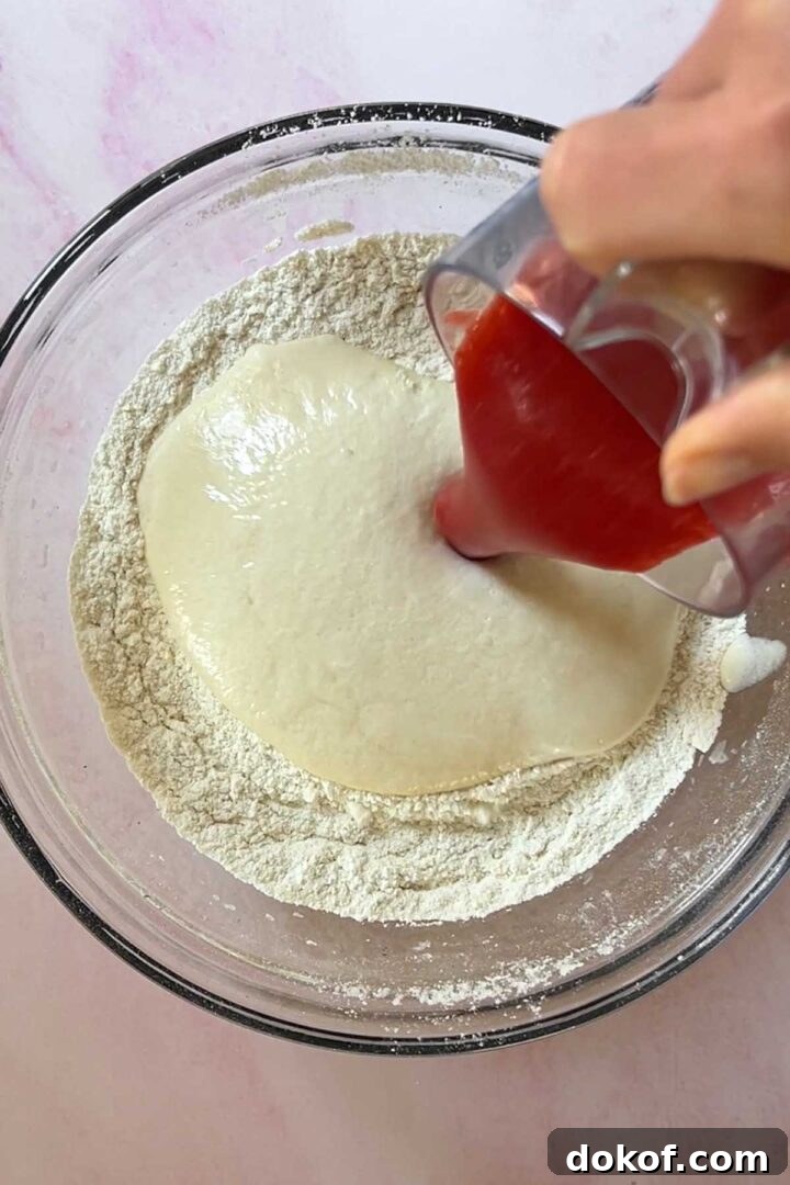 Fresh Strawberry Sheet Cake Recipe — Moist, Fruity Dessert 11 Add egg mixture and strawberry puree to the dry ingredients.