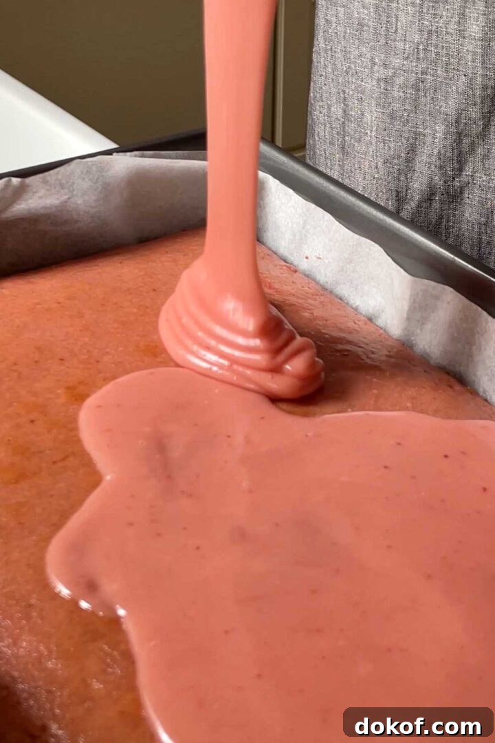 Fresh Strawberry Sheet Cake Recipe — Moist, Fruity Dessert 18 Pour icing over the cake while it is still just slightly warm.