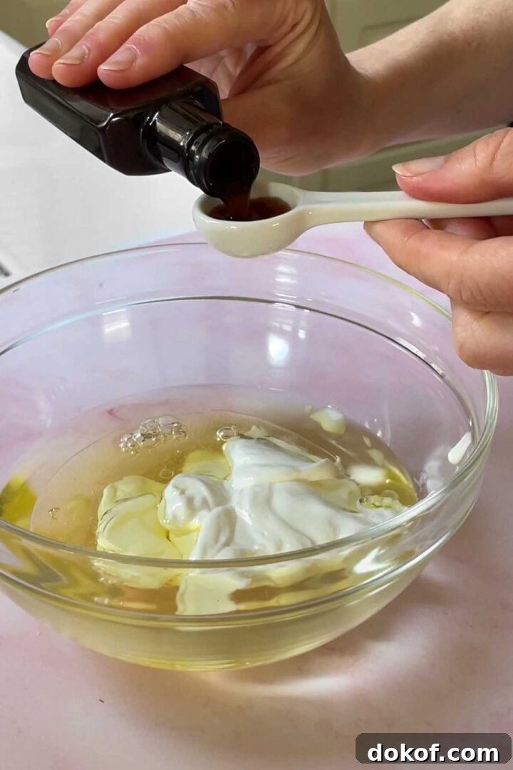 Fresh Strawberry Sheet Cake Recipe — Moist, Fruity Dessert 9 Add sour cream and vanilla and whisk to combine.