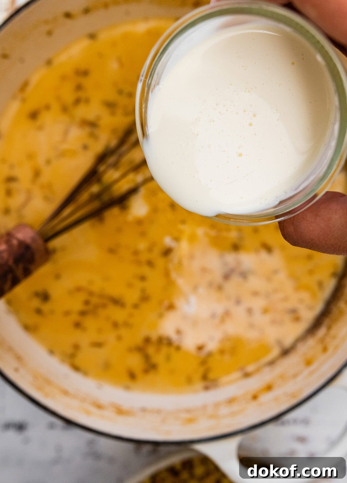 how to make potato corn chowder recipe step-by-step: add the cream to the soup.