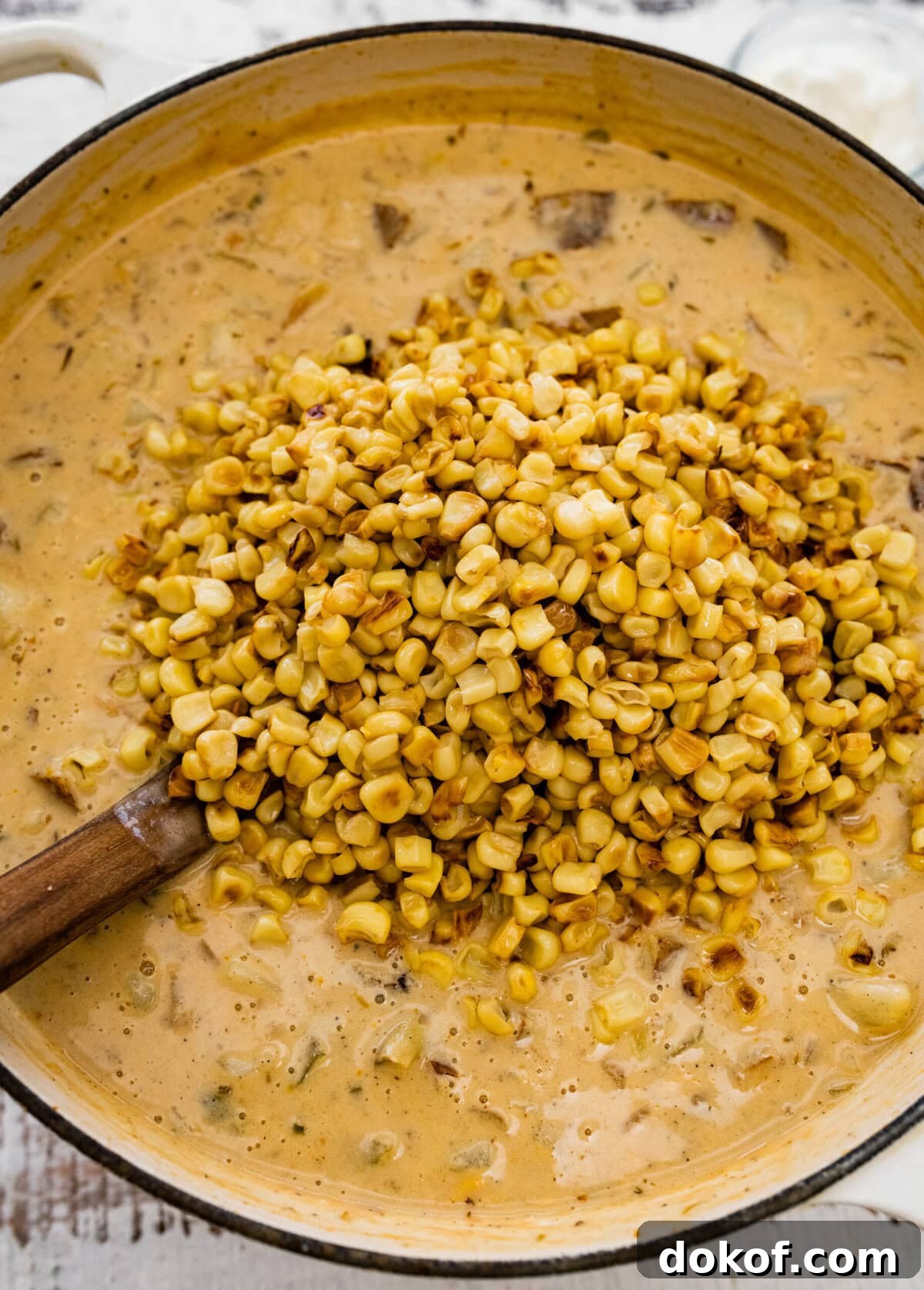 how to make potato corn chowder recipe step-by-step: add the corn back to the pot with the soup in it.