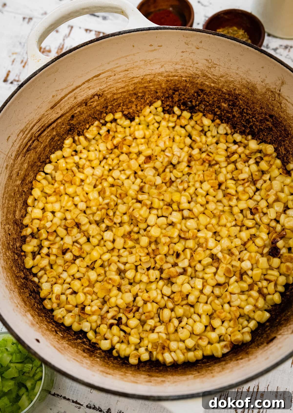 Lightly cooked corn in a pot.