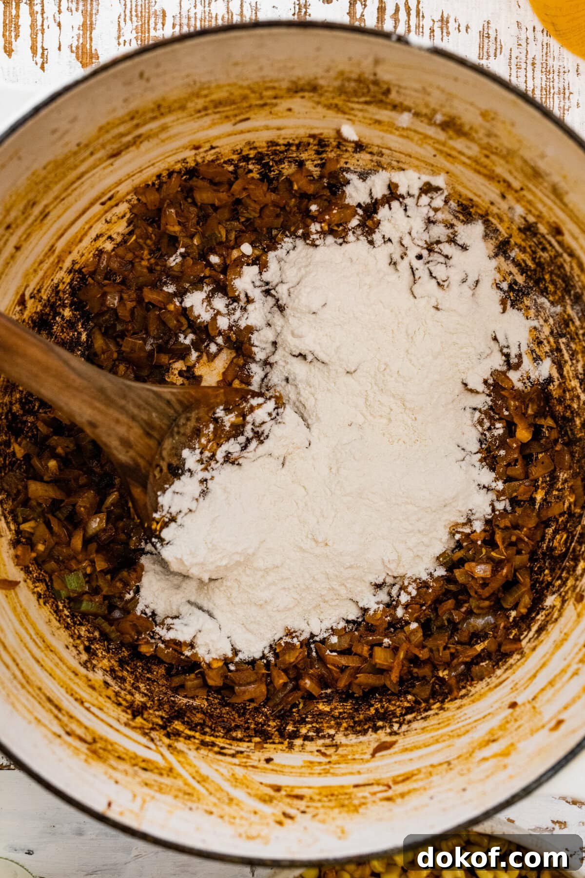 how to make potato corn chowder recipe step-by-step: add flour to make the roux soup base.