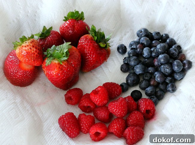 Place washed berries on paper towel to absorb excess water