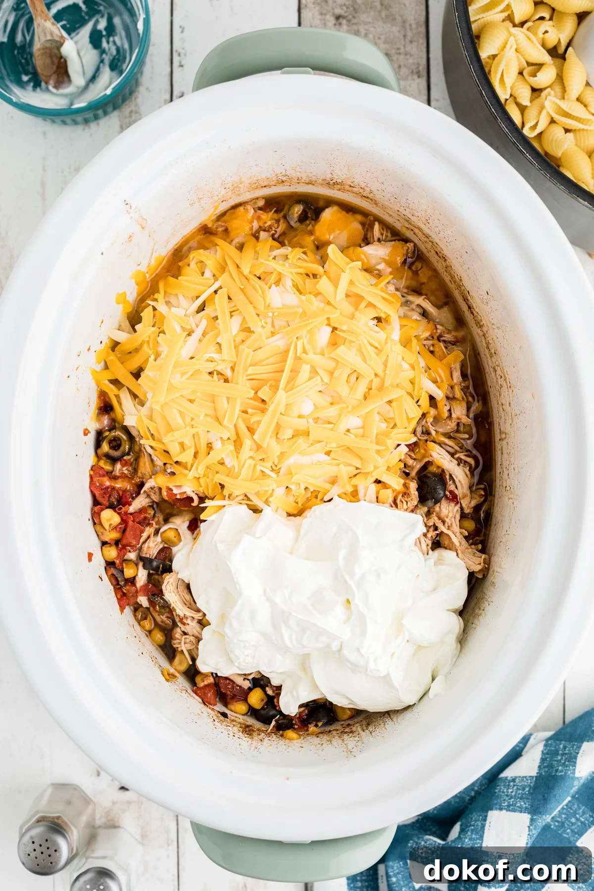 Southwestern Cheesy Chicken Pasta Bake with Roasted Corn and Peppers 5 chicken, cheese, and sour cream.