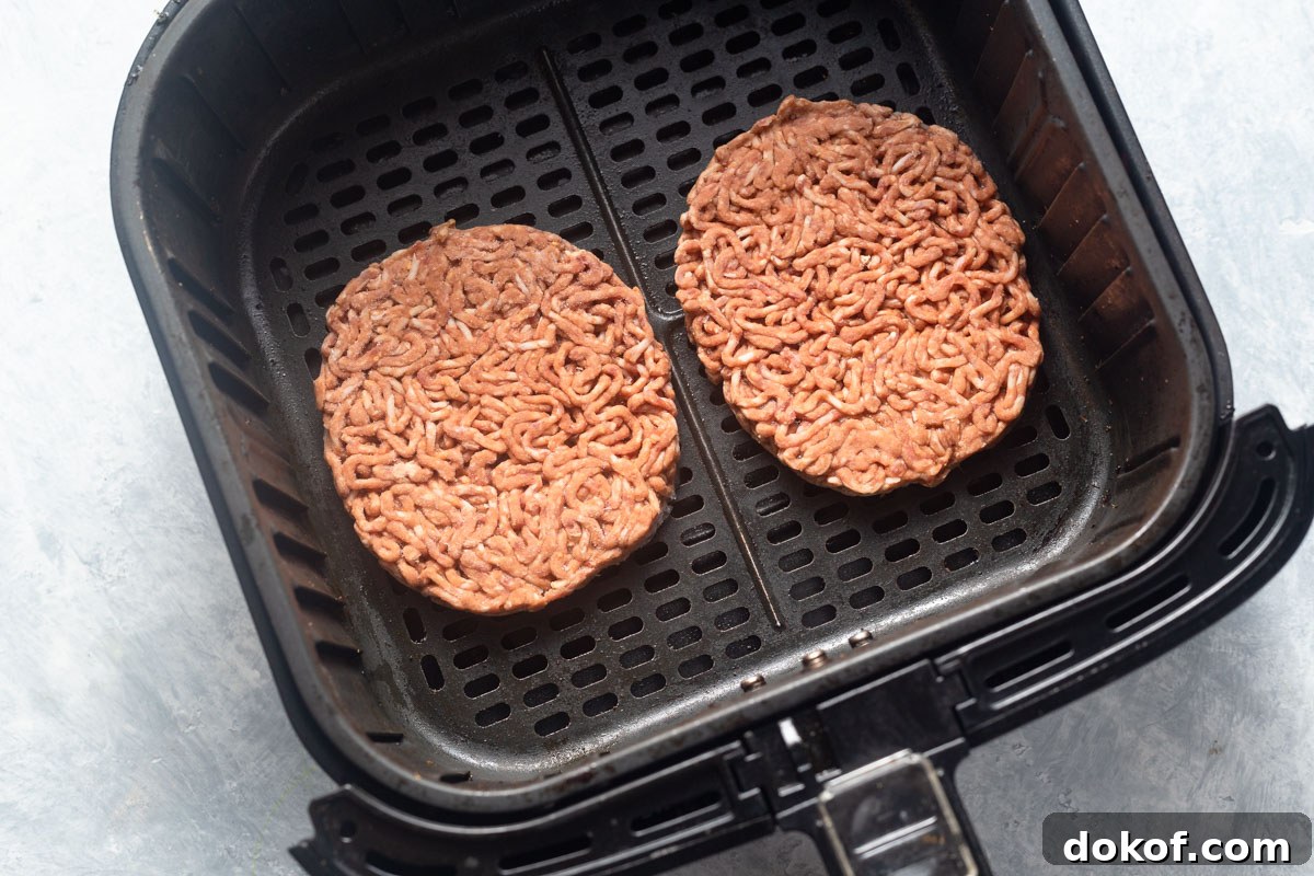 frozen burgers in the air fryer basket