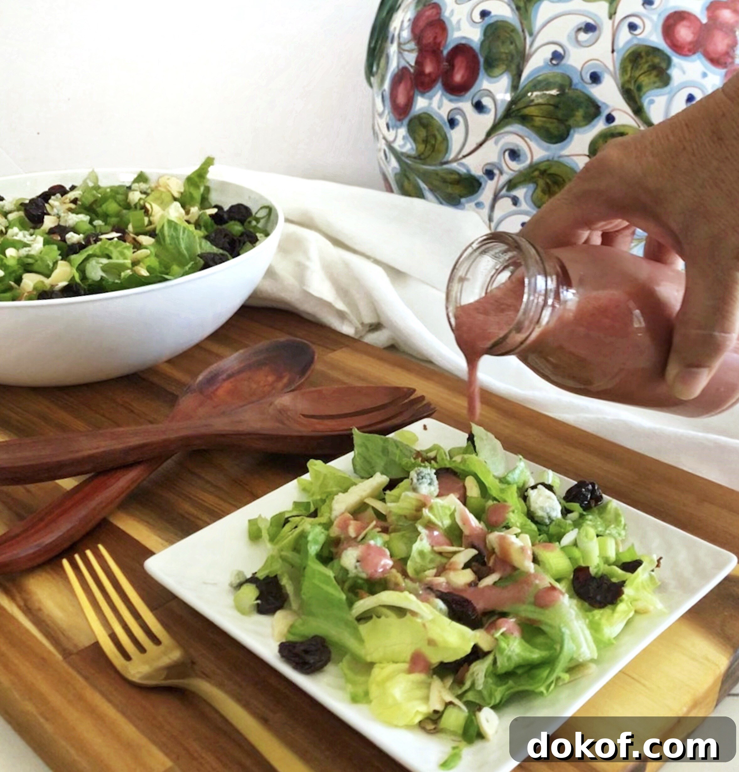 Cherry Vinaigrette Recipe: Tangy Salad Dressing with Fresh Cherries 3 cherry vinaigrette pouring over cherry salad with gorgonzola and toasted almonds