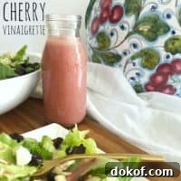 Cherry Vinaigrette Recipe: Tangy Salad Dressing with Fresh Cherries 6 pink bottle of cherry vinaigrette with salad
