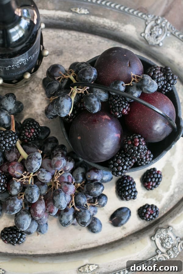 Black fruit on a platter.