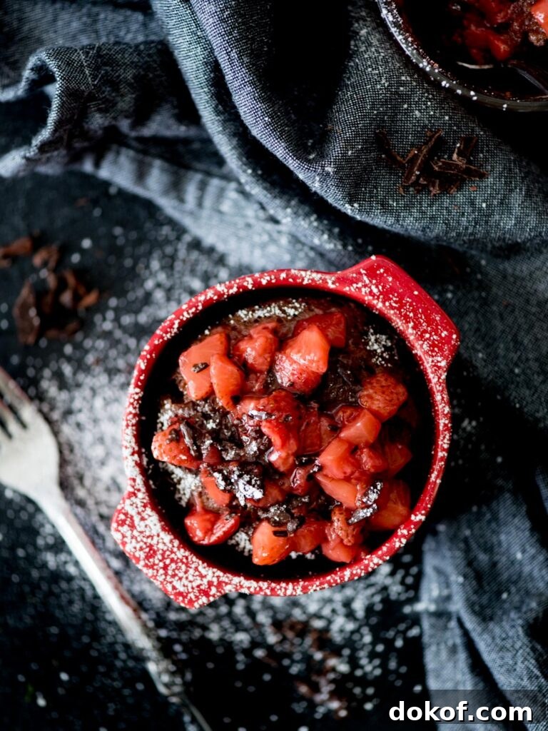 Quick Microwave Chocolate Mug Cake Recipe in 2 Minutes 2 Chocolate Mug Cake with Sweet Strawberry Topping with powdered sugar