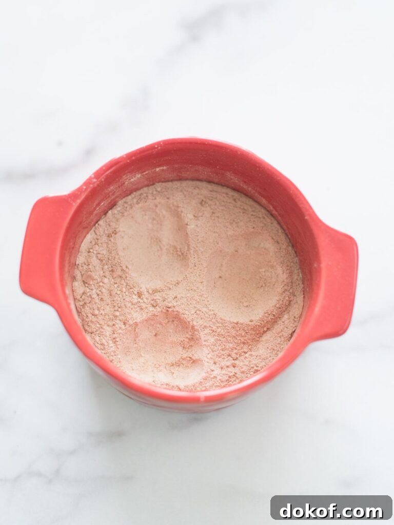 Quick Microwave Chocolate Mug Cake Recipe in 2 Minutes 11 wells made in dry ingredients in mug