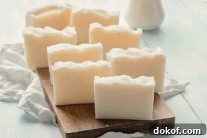 cut soap bars on wooden board.