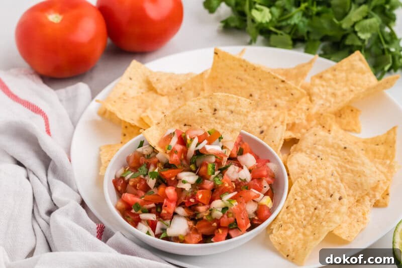 Authentic Pico de Gallo Recipe: Fresh Mexican Salsa Tutorial 5 bowl of Pico de Gallo served with tortilla chips.