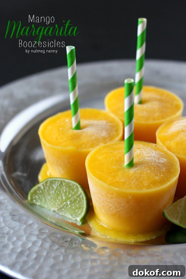 This delicious mango margarita boozesicle takes your favorite cocktail and turn it into a boozy summertime treat. Hello boozesicles!