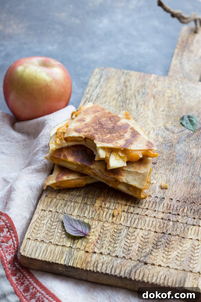 Creamy Pumpkin and Apple Quesadillas for Fall Comfort 2 If you're looking for a simple comfort food dinner (or lunch) that tastes like fall-- this is it! Creamy Pumpkin Apple Quesadillas are perfect for little hands for snacking after school or before trick or treating.