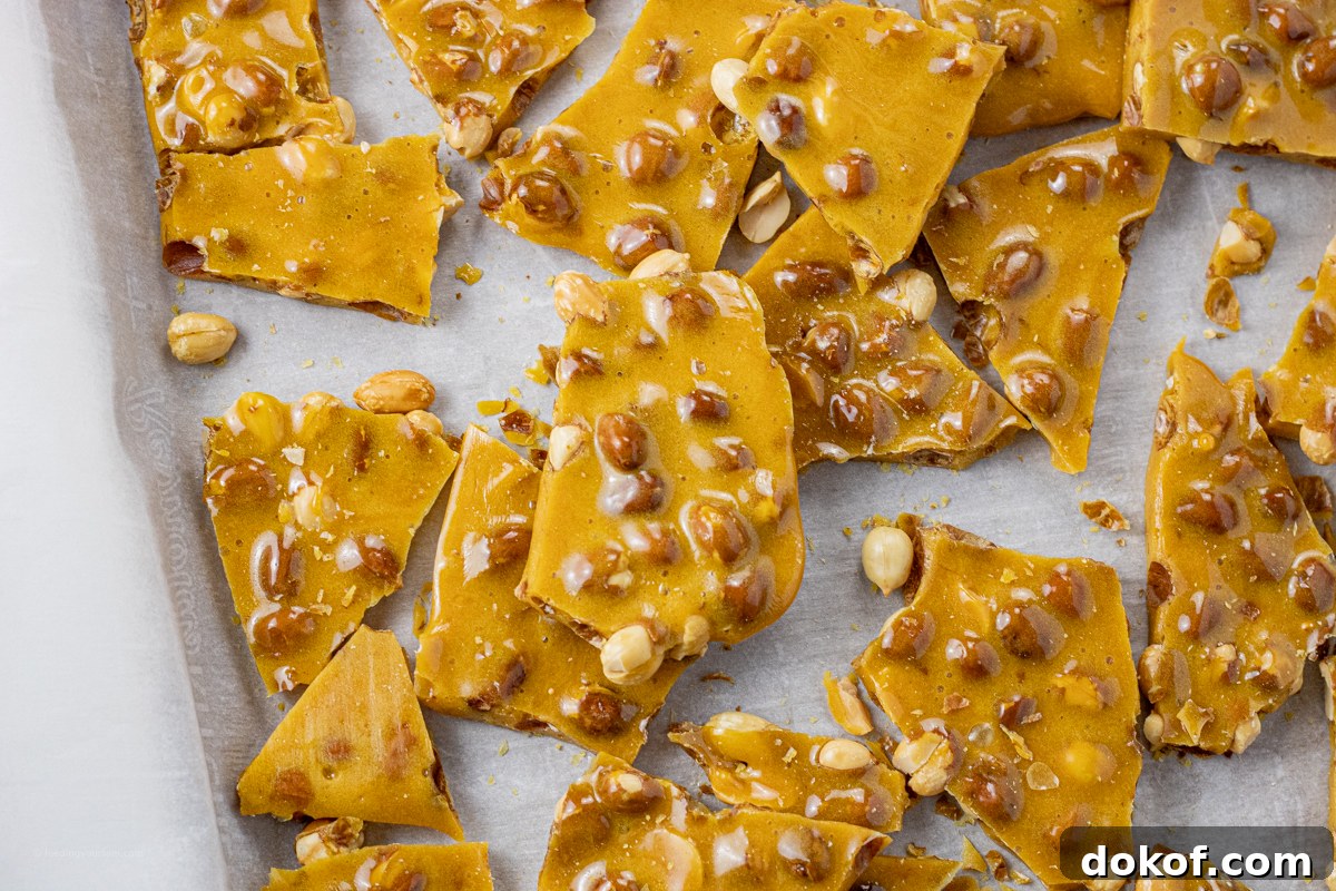 broke up pieces of peanut candy on a baking sheet