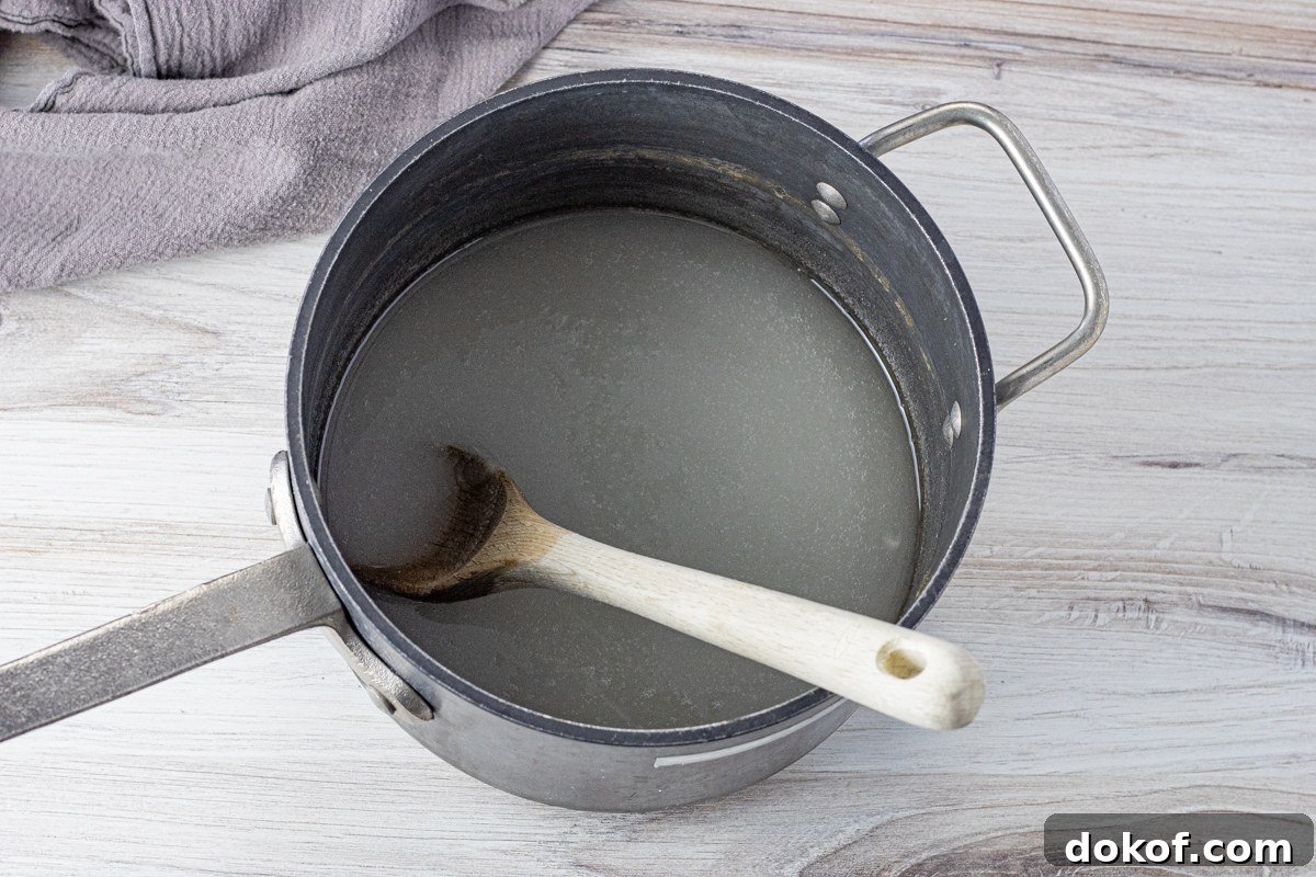 large black pot will with sugar and corn syrup mixture