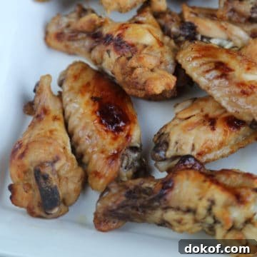Mango Jerk Chicken Wings on a white platter