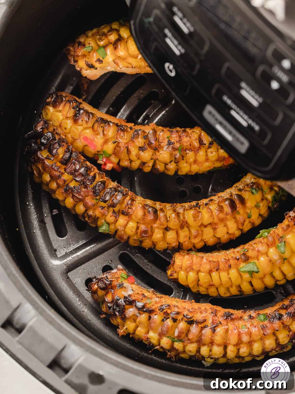 Overhead view of corn ribs in the air fryer