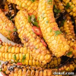 A pile of air fryer corn ribs on a plate