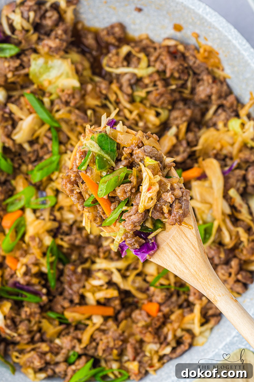 Egg Roll in a Bowl is a delicious deconstructed take on traditional egg rolls, featuring hearty ground sausage stir-fried with vegetables.
