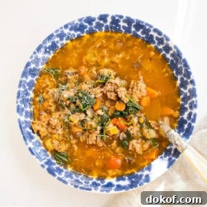 Bowl of sausage and lentil soup.