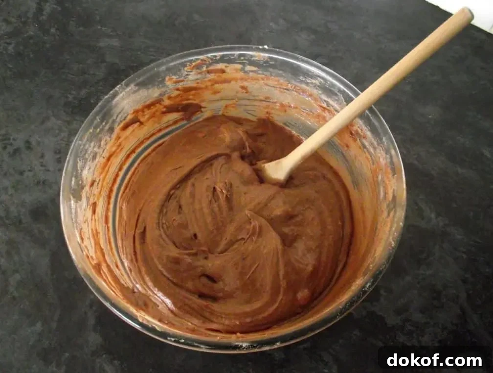 Mars Bar Cupcakes batter in a glass bowl