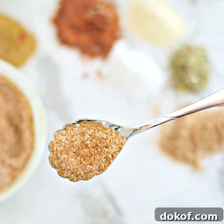 A spoonful of seasoning that is ready to know how to season pinto beans