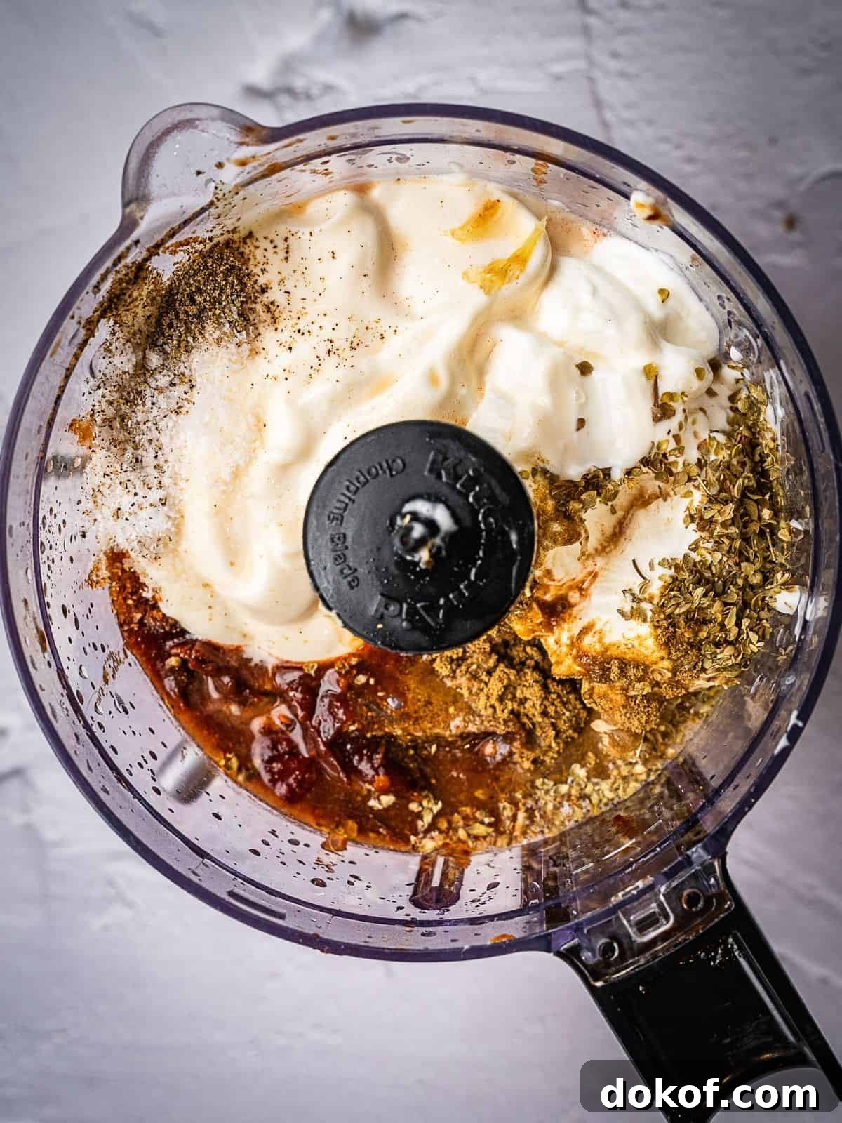 Food processor with the recipe ingredients before processing.