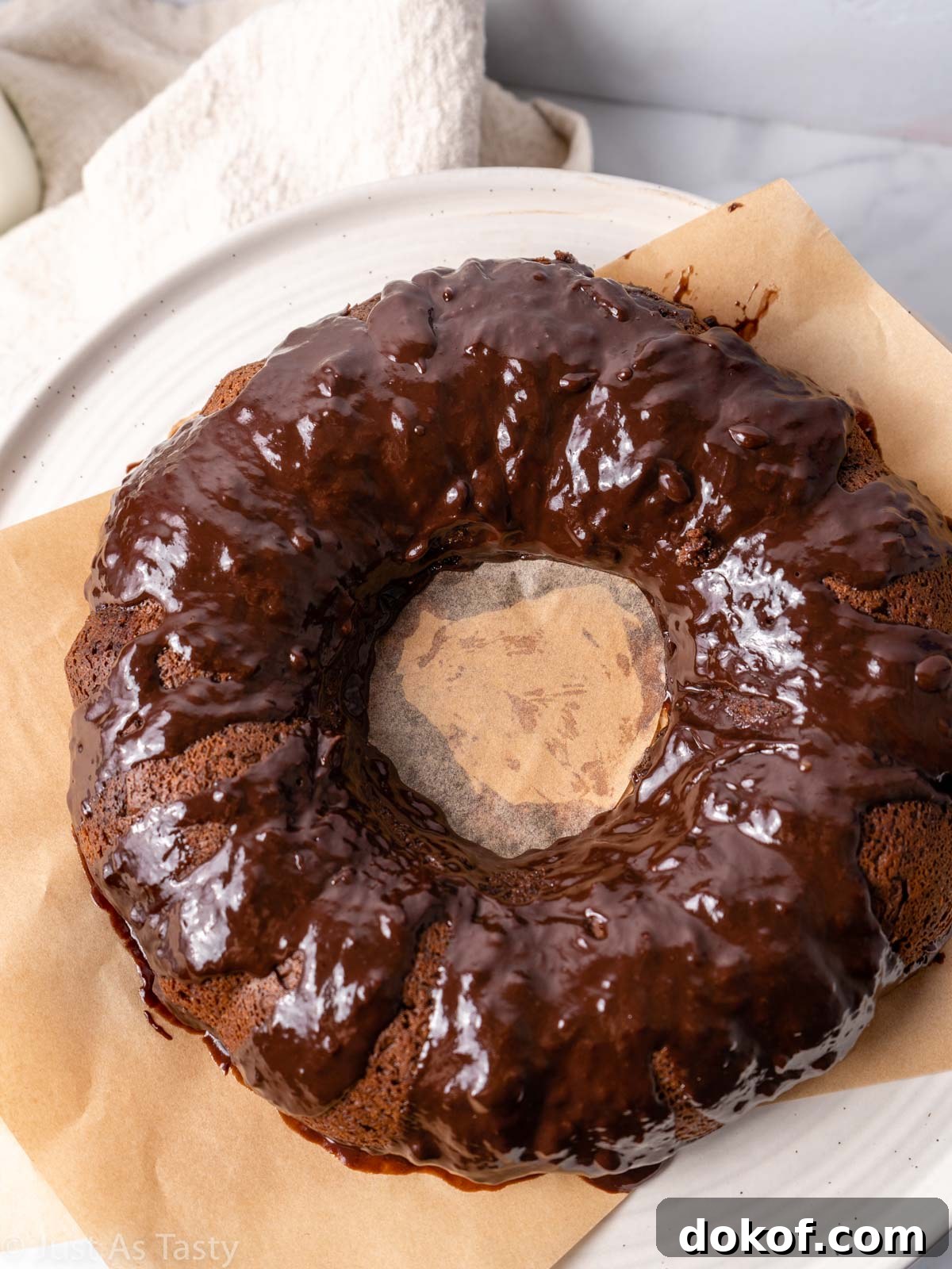 Chocolate bundt cake topped with chocolate ganache.