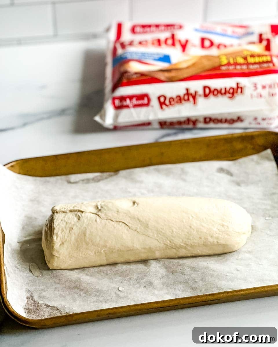 a loaf of thawing frozen dough