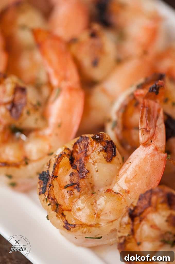 Grilled Shrimp with Roasted Red Pepper Aioli Recipe 6 A close up of shrimp on a plate, with Aioli