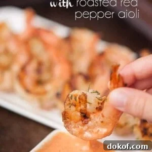 Grilled Shrimp with Roasted Red Pepper Aioli Recipe 7 a close up of grilled shrimp with roasted red pepper aioli