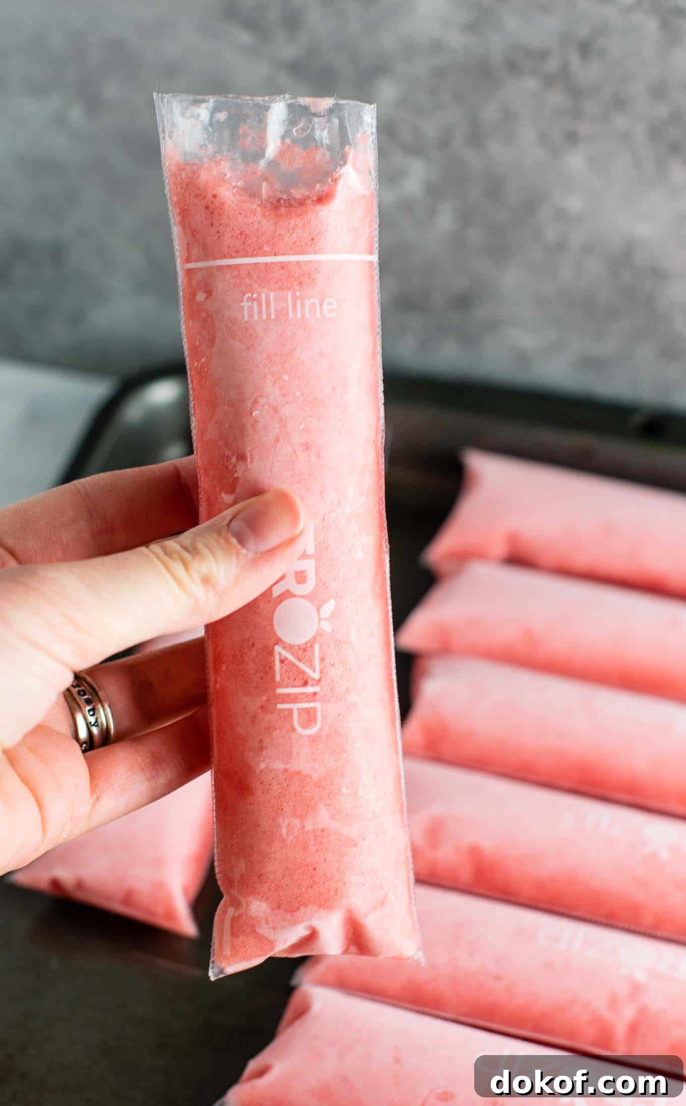 Finished strawberry pineapple freezer pops laid out