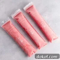 Strawberry pineapple freezer pops